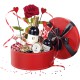 Coffret rond rouge avec noeud